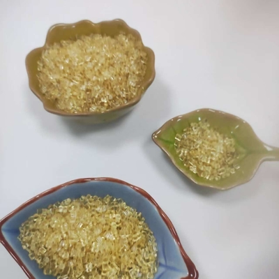 Putih atau Kuning Putih Granular Chlorinated Polypropylene untuk Packing Film Of Candy dan BOPP Composite Packing.